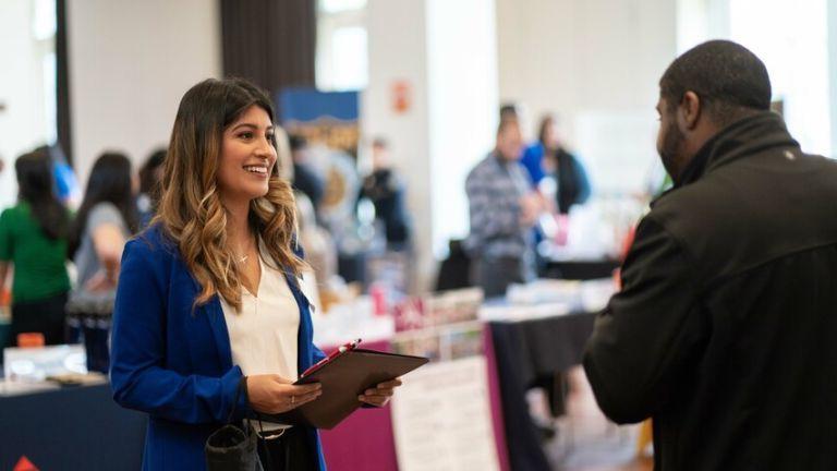 student at career services job fair